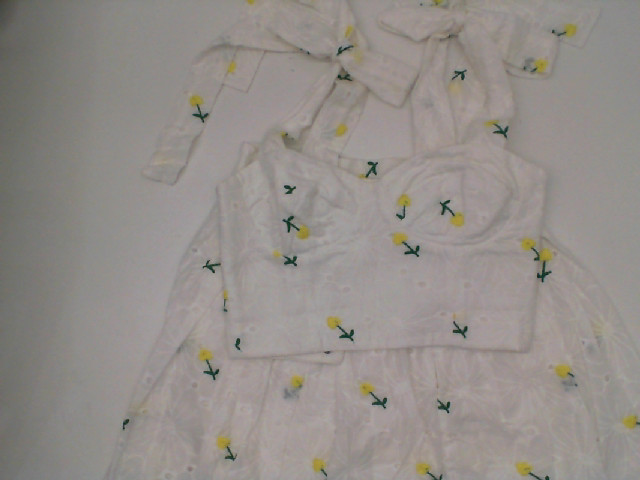 Women's strapless tank top and short skirt, white with yellow-brown pattern Women's strapless tank top and short skirt, white with yellow-brown pattern