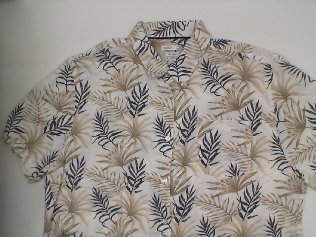 White Hawaiian shirt with leaf pattern White Hawaiian shirt with leaf pattern