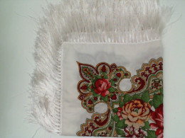 White tablecloth with floral pattern 