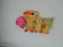 Set of 4 Yellow duck and pink elephant dolls Set of 4 Yellow duck and pink elephant dolls