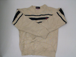 Lacoste Women's cream-colored turtleneck sweater with blue pattern