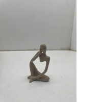 Souvenir figurine in the form of a woman