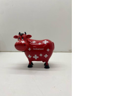 Red cow piggy bank