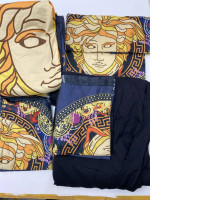 Set of Black bed sheet and pillowcase set with yellow pattern 