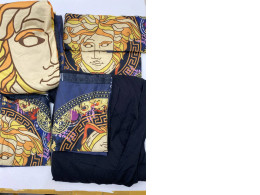 Set of Black bed sheet and pillowcase set with yellow pattern 