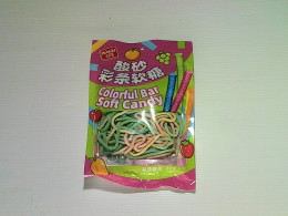 Soft candies in a multi-colored bar