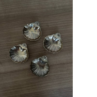Set of 4 shell shaped plates Set of 4 shell shaped plates