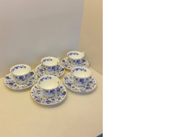 Set of 5 tea cups and 5 saucers