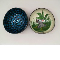 Set of 2 Coconut shells are decorated with beautiful patterns. 