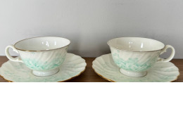 Set of 2 mugs and 2 saucers