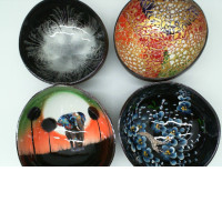 Set of 4 Coconut shells are decorated with beautiful patterns.  