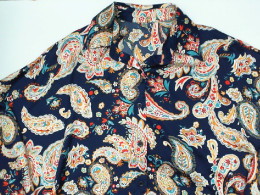 Blue shirt with gold pattern 