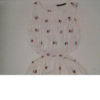 Long white dress with red cherry pattern