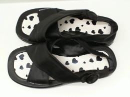 Women's black sandals with white pattern 