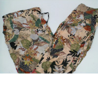 Cream colored long pants with leaf pattern 