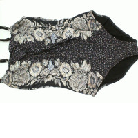 Women's black swimsuit with floral pattern 