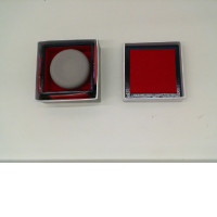 Green soap in a red box 