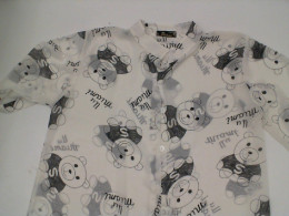 Women's long dress with round neck, white buttons, black bear pattern