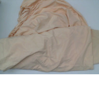 Cream colored 6-square bed sheet