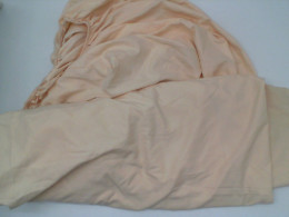 Cream colored 6-square bed sheet Cream colored 6-square bed sheet