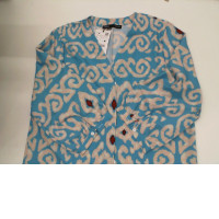 Long blue button-up dress with cream pattern 