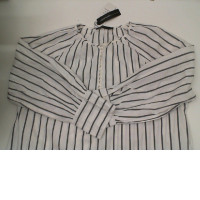 Women's long-sleeved white dress with black stripes