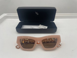 Women's pink sunglasses