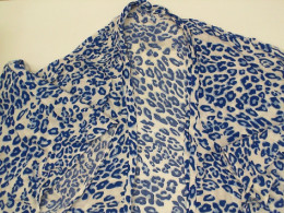 White bathrobe with blue pattern 