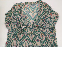 Women's long-sleeved white dress with green pattern 