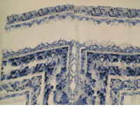 White coat with blue pattern 