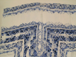 White coat with blue pattern 