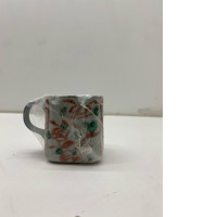 Japanese ceramic coffee mug with cherry blossom pattern