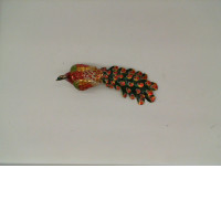 Golden peacock decorates the desk 