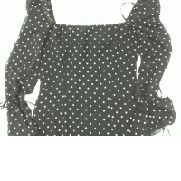 Black off-shoulder long dress with white polka dots 
