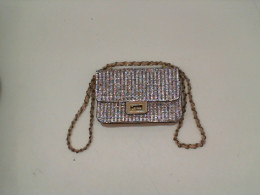 Women's gold and silver shoulder bag Women's gold and silver shoulder bag