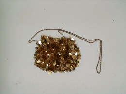 Small gold women's shoulder bag 