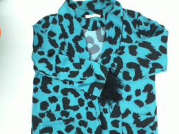 Women's purple suit with black pattern 