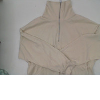 Women's cream turtleneck workout top 