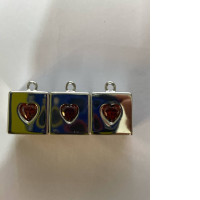 Set of 3 Square pendant necklace with a red heart in the center. 