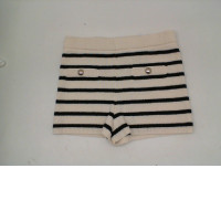 Women's white shorts with black stripes