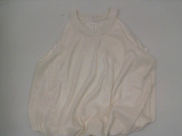 Women's cream-colored round-neck sleeveless shirt