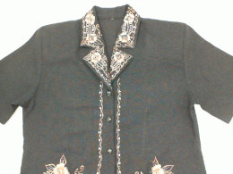 Dark grey short sleeve shirt with white and gold pattern 