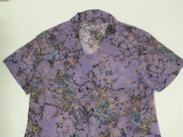 Light blue short-sleeved shirt with rainbow pattern 