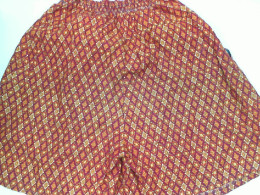 Yellow and red Thai pattern shorts