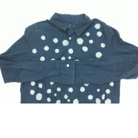 Blue long-sleeved shirt with white polka dots