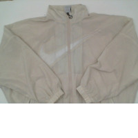 Cream colored workout warm-up shirt 