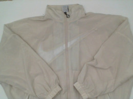 Cream colored workout warm-up shirt Cream colored workout warm-up shirt