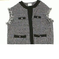 Women's sleeveless shirt with white buttons and black stripes 