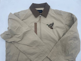 Beige jacket with a collar with a duck patch Beige jacket with a collar with a duck patch