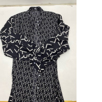 Women's long sleeve black dress with white pattern 